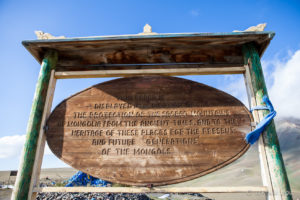 Wooden signboard at the Ovoo, Altai Mountains, Mongolia