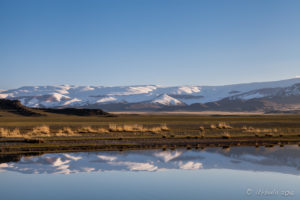 Reflections of the Altai Mountains in Uureg Lake, Mongolia