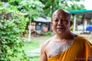 Portrait: Thai monk at Ban Mae Pae Village School, Thailand