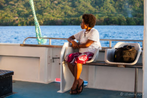 Papuan woman on a boat, Milne Bay PNG