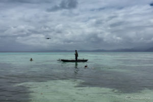 Reef Fisherman,a Drone and Snorkelling Tourists, Milne Bay PNG