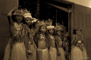 Young Papuan girls in feathers and grass skirts, Tawali Resort, Milne Bay PNG