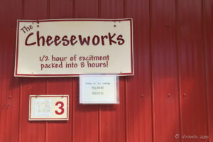 Signs on a door at the Little Qualicum Cheeseworks and Mooberry Winery