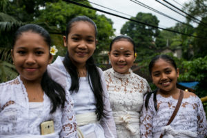 Portrait of four young Balinese women in traditional dress, Ubud