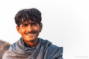 Closeup of an Indian man in a Blue Scarf, Pushkar Fair Grounds, Rajasthan