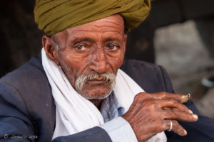 Closeup of an Indian man in a Green Turban, Pushkar Fair Grounds, Rajasthan