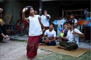 Young girl in Thai dress dancing