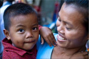 Young boy with smiling mum