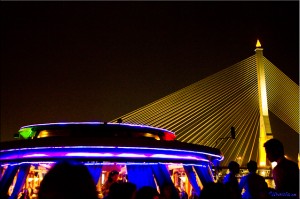 Rama VIII bridge and boat silhouette at night