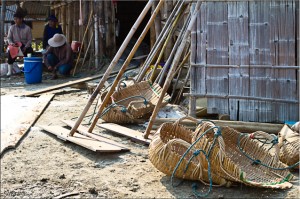 Rakes and baskets at the salt pans, Samut Sakorn