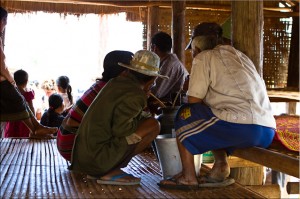 Lawae Men Around a Large Pot of Rice Wine
