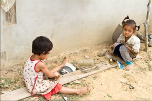 Children playing in the dirt