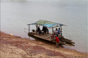 Small wooden ferry on pontoons, Xe Kong, Laos