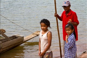 Old Man and two pre-teen lao girls