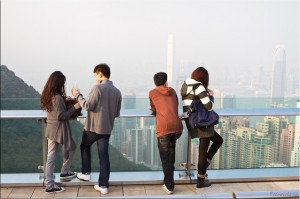 Young People on the Sky Terrace Against a Smoggy Skyline