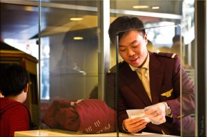 Male in a Ticket Booth, The Peak Tram, Hong Kong