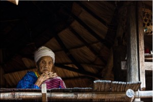 Elderly Karen woman sitting in her house