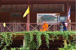 Monk on the school balcony