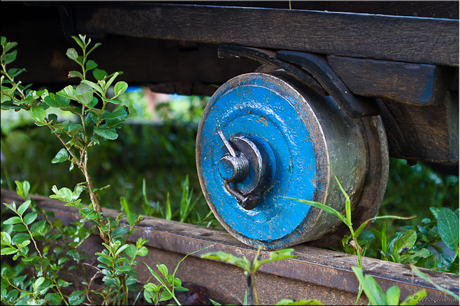 Blue metal wheel on a track