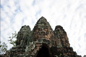 The Face of South Gate, Angkor Thom against the sky.