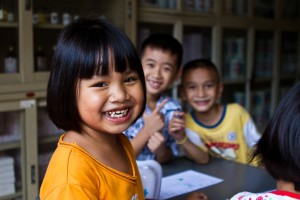 Three smiling thai children