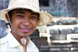 Young khmer male in straw hat
