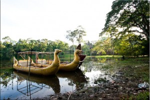 Golden long-boats with pheasant-head prows, Angkor Thom moat