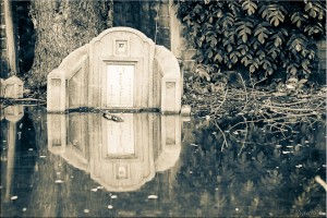 Flooded Chinese headstone + reflection