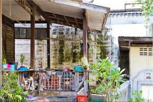 Back porch of a Thai house - bordering a graveyard