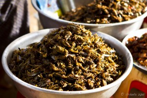 Bowls of battered and fried crickets.