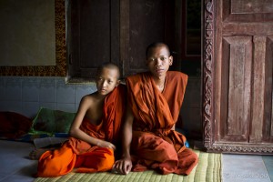 Two khmer Buddhist monks, sitting.