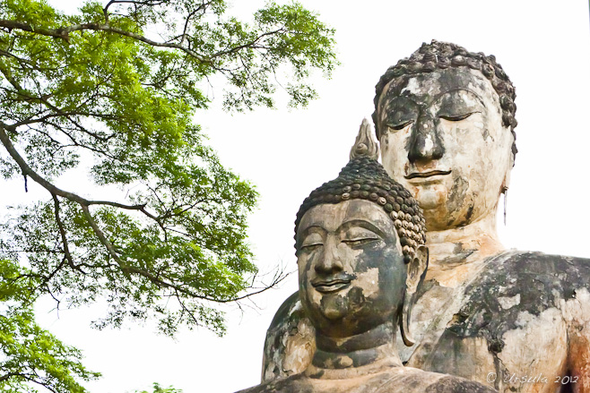 Heads of two large Sukhothai-periiod Buddhas