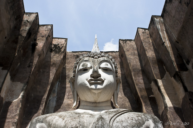 Large white Sukhothai Buddha head.