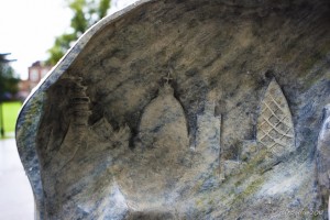 London skyline in relief on the concave side of a marble sculpture.