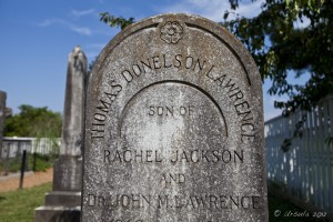 Carved headstone: Thomas Donaldson Lawrence.