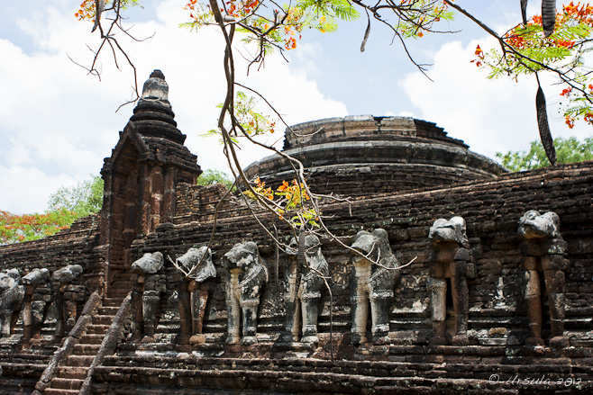 Ceylonese-style temple with Thai elephant carvings.