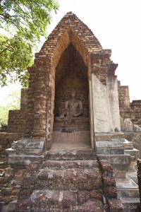 Buddha in a shrine housing
