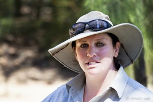 Portrait of an Australian woman in a felt cowboy hat.