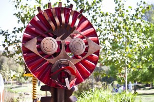 Modern sculpture: Red Kenyan round face mask, Western Plains Zoo