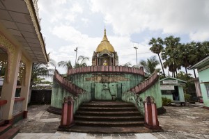 Weathered curved walls of a small shrine area in Shwemawdaw Temple, Bago, Myanmar