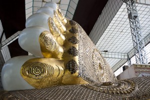 The gilded and jewelled feet of the Shwethalyaung Buddha.