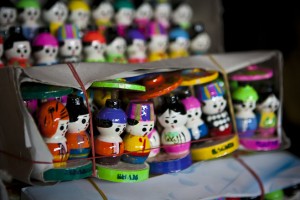 Colourfully painted little wooden dolls representing Burma's ethnic groups.
