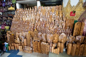Carved Burmese teak ornaments: Shwethalyaung Buddha Temple