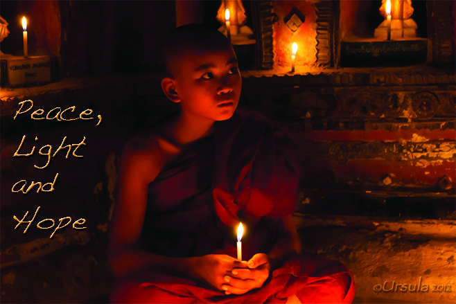 Text: Peace, Love and Light Picture: Young Burmese monk with a candle