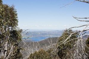 Lanscape view: Lake Jindabyne and East Jindabyne with a blue sky; Rennix Walk.