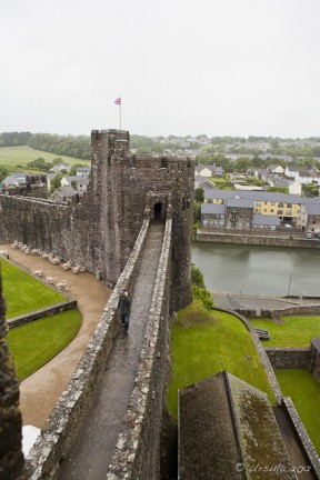 View along a wet Pembroke Castle walkway.