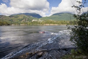 Landscape: A lone kayaker rides through the tide change at Skookumchuck.