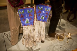 Buffalo Bill Historical Center Museum case: Annie Oakley's white kid gloves with blue beading.