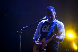 Backlit portrait: Ben Harper on guitar
