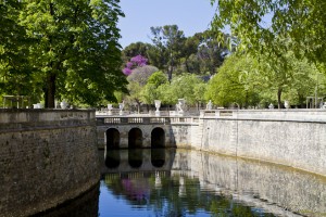 Lanscape: View across the canal to the roadway leading into the Jardins de la Fontaine, Nîmes